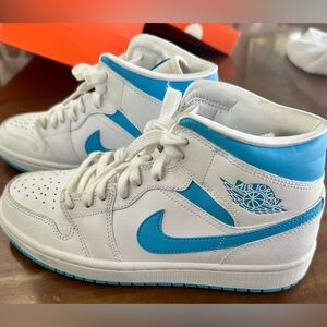 Jordan womens  UNC  White and Blue Sneakers